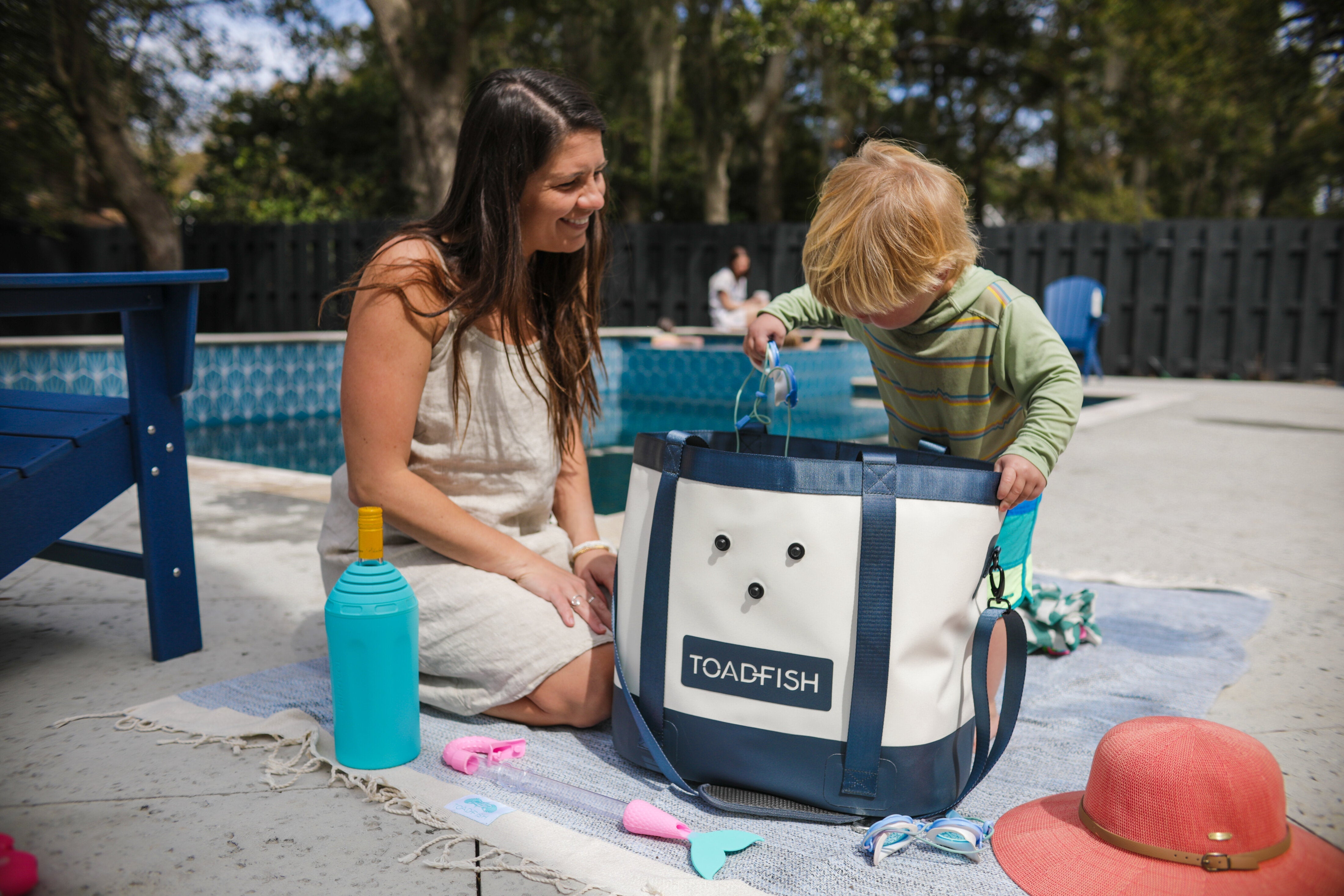 A calm marsh is depicted with a Great Blue Heron wading in it. Above the added text reads "Marsh Madness"